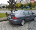 Сірий Міцубісі Lancer, об'ємом двигуна 1.58 л та пробігом 209 тис. км за 2900 $, фото 7 на Automoto.ua