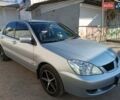 Сірий Міцубісі Lancer, об'ємом двигуна 1.6 л та пробігом 60 тис. км за 7000 $, фото 7 на Automoto.ua