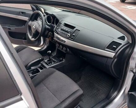 Серый Мицубиси Лансер, объемом двигателя 1.5 л и пробегом 197 тыс. км за 5499 $, фото 11 на Automoto.ua