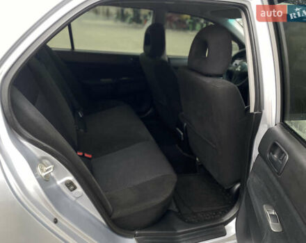 Сірий Міцубісі Lancer, об'ємом двигуна 1.58 л та пробігом 280 тис. км за 4650 $, фото 9 на Automoto.ua