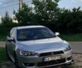 Серый Мицубиси Лансер, объемом двигателя 2 л и пробегом 448 тыс. км за 6800 $, фото 1 на Automoto.ua