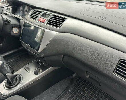 Сірий Міцубісі Lancer, об'ємом двигуна 1.58 л та пробігом 94 тис. км за 6500 $, фото 10 на Automoto.ua