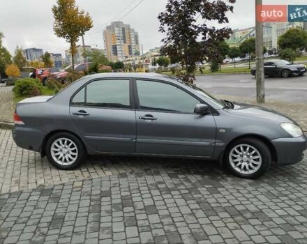 Сірий Міцубісі Lancer, об'ємом двигуна 1.58 л та пробігом 209 тис. км за 2900 $, фото 6 на Automoto.ua