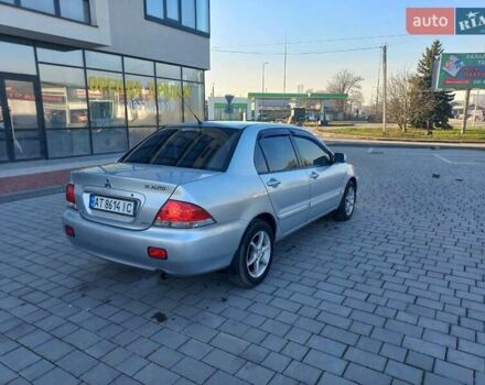 Серый Мицубиси Лансер, объемом двигателя 1.6 л и пробегом 228 тыс. км за 2999 $, фото 13 на Automoto.ua