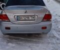 Серый Мицубиси Лансер, объемом двигателя 1.6 л и пробегом 180 тыс. км за 4750 $, фото 5 на Automoto.ua