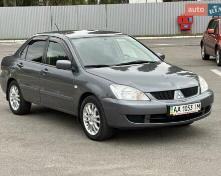Сірий Міцубісі Lancer, об'ємом двигуна 1.58 л та пробігом 94 тис. км за 6500 $, фото 4 на Automoto.ua