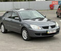 Сірий Міцубісі Lancer, об'ємом двигуна 1.58 л та пробігом 94 тис. км за 6500 $, фото 4 на Automoto.ua