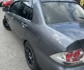 Сірий Міцубісі Lancer, об'ємом двигуна 1.58 л та пробігом 119 тис. км за 7200 $, фото 14 на Automoto.ua