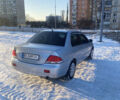 Сірий Міцубісі Lancer, об'ємом двигуна 1.6 л та пробігом 244 тис. км за 4999 $, фото 3 на Automoto.ua