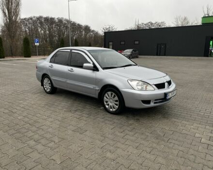 Сірий Міцубісі Lancer, об'ємом двигуна 1.6 л та пробігом 240 тис. км за 4650 $, фото 1 на Automoto.ua