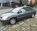 Сірий Міцубісі Lancer, об'ємом двигуна 1.58 л та пробігом 209 тис. км за 2900 $, фото 8 на Automoto.ua