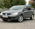 Сірий Міцубісі Lancer, об'ємом двигуна 1.58 л та пробігом 94 тис. км за 6500 $, фото 1 на Automoto.ua