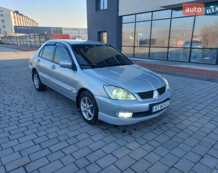 Серый Мицубиси Лансер, объемом двигателя 1.6 л и пробегом 228 тыс. км за 2999 $, фото 8 на Automoto.ua