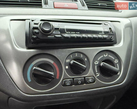 Сірий Міцубісі Lancer, об'ємом двигуна 0 л та пробігом 62 тис. км за 7250 $, фото 25 на Automoto.ua