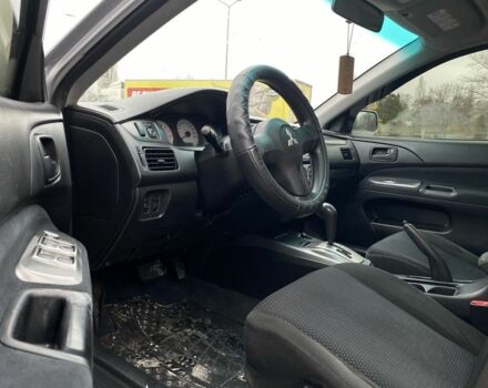Сірий Міцубісі Lancer, об'ємом двигуна 1.6 л та пробігом 240 тис. км за 4650 $, фото 11 на Automoto.ua