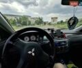 Серый Мицубиси Лансер, объемом двигателя 1.6 л и пробегом 210 тыс. км за 4123 $, фото 8 на Automoto.ua