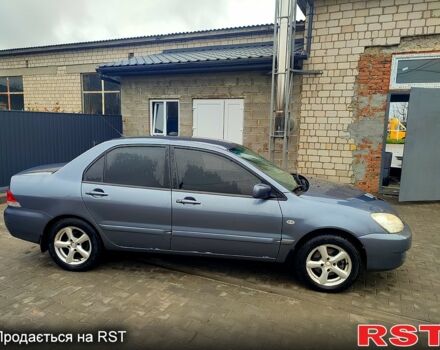 Сірий Міцубісі Lancer, об'ємом двигуна 1.6 л та пробігом 197 тис. км за 3600 $, фото 3 на Automoto.ua