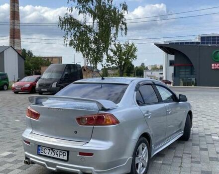 Серый Мицубиси Лансер, объемом двигателя 1.5 л и пробегом 303 тыс. км за 4900 $, фото 21 на Automoto.ua