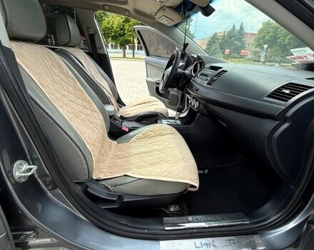 Мицубиси Лансер 2009 в Смеле на Automoto.ua Серый Мицубиси Лансер, объемом двигателя 2 л и пробегом 183 тыс. км за 6500 $, фото 4 на Automoto.ua