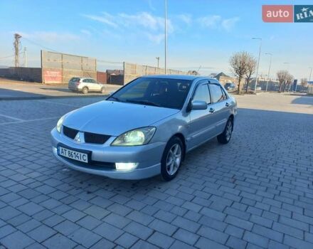 Серый Мицубиси Лансер, объемом двигателя 1.6 л и пробегом 228 тыс. км за 3450 $, фото 30 на Automoto.ua