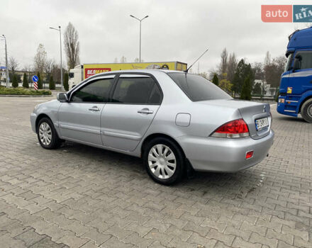 Сірий Міцубісі Lancer, об'ємом двигуна 1.58 л та пробігом 280 тис. км за 4650 $, фото 3 на Automoto.ua