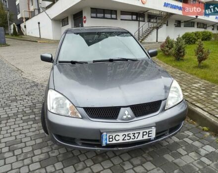 Сірий Міцубісі Lancer, об'ємом двигуна 1.58 л та пробігом 209 тис. км за 2900 $, фото 5 на Automoto.ua