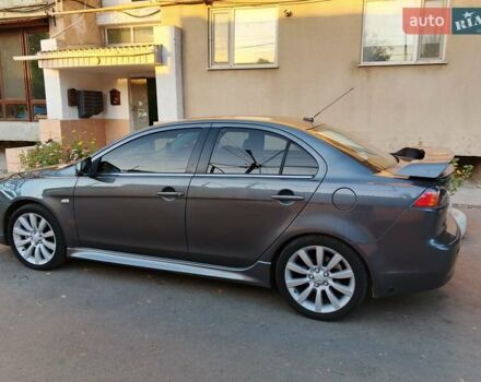 Серый Мицубиси Лансер, объемом двигателя 2.36 л и пробегом 225 тыс. км за 8500 $, фото 1 на Automoto.ua