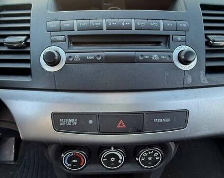 Серый Мицубиси Лансер, объемом двигателя 2 л и пробегом 272 тыс. км за 4499 $, фото 9 на Automoto.ua