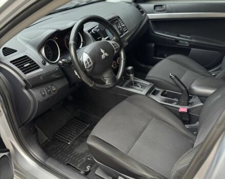 Серый Мицубиси Лансер, объемом двигателя 2 л и пробегом 220 тыс. км за 7450 $, фото 12 на Automoto.ua