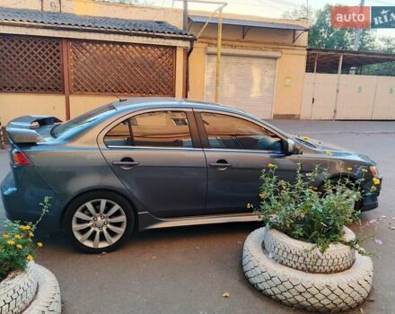 Серый Мицубиси Лансер, объемом двигателя 2.36 л и пробегом 225 тыс. км за 8500 $, фото 5 на Automoto.ua