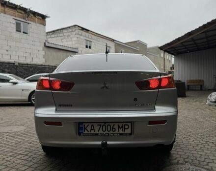 Серый Мицубиси Лансер, объемом двигателя 2 л и пробегом 220 тыс. км за 7450 $, фото 3 на Automoto.ua