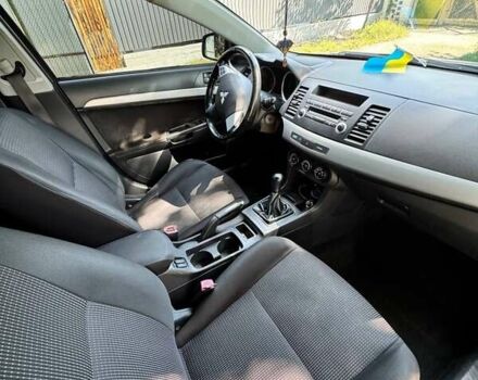 Серый Мицубиси Лансер, объемом двигателя 1.5 л и пробегом 265 тыс. км за 6500 $, фото 6 на Automoto.ua