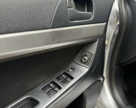 Серый Мицубиси Лансер, объемом двигателя 2 л и пробегом 220 тыс. км за 7450 $, фото 6 на Automoto.ua