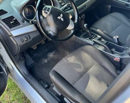 Серый Мицубиси Лансер, объемом двигателя 1.5 л и пробегом 265 тыс. км за 6500 $, фото 5 на Automoto.ua