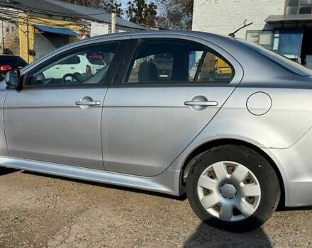 Серый Мицубиси Лансер, объемом двигателя 2 л и пробегом 272 тыс. км за 4499 $, фото 3 на Automoto.ua