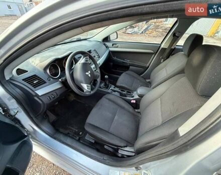 Серый Мицубиси Лансер, объемом двигателя 2 л и пробегом 272 тыс. км за 4499 $, фото 6 на Automoto.ua