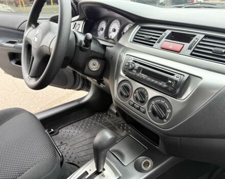 Сірий Міцубісі Lancer, об'ємом двигуна 1.6 л та пробігом 62 тис. км за 7300 $, фото 8 на Automoto.ua