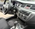 Сірий Міцубісі Lancer, об'ємом двигуна 1.6 л та пробігом 62 тис. км за 7300 $, фото 8 на Automoto.ua