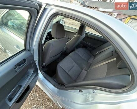 Серый Мицубиси Лансер, объемом двигателя 2 л и пробегом 272 тыс. км за 4499 $, фото 11 на Automoto.ua