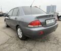 Сірий Міцубісі Lancer, об'ємом двигуна 1.6 л та пробігом 62 тис. км за 7300 $, фото 3 на Automoto.ua