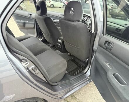 Сірий Міцубісі Lancer, об'ємом двигуна 1.6 л та пробігом 62 тис. км за 7300 $, фото 17 на Automoto.ua