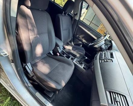 Серый Мицубиси Лансер, объемом двигателя 1.5 л и пробегом 265 тыс. км за 6500 $, фото 7 на Automoto.ua