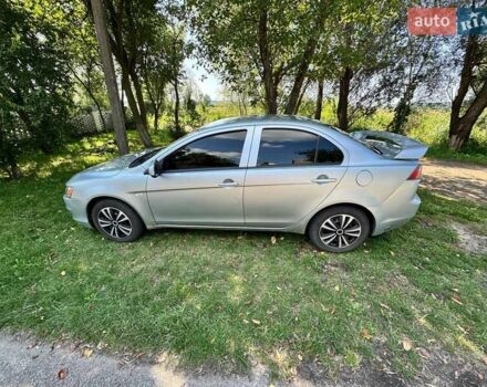 Серый Мицубиси Лансер, объемом двигателя 1.5 л и пробегом 265 тыс. км за 6500 $, фото 1 на Automoto.ua