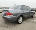 Сірий Міцубісі Lancer, об'ємом двигуна 1.6 л та пробігом 62 тис. км за 7300 $, фото 2 на Automoto.ua