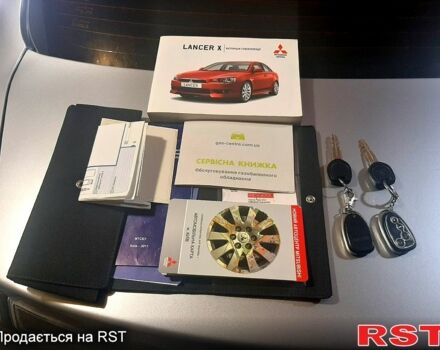 Сірий Міцубісі Lancer, об'ємом двигуна 1.5 л та пробігом 180 тис. км за 7750 $, фото 9 на Automoto.ua