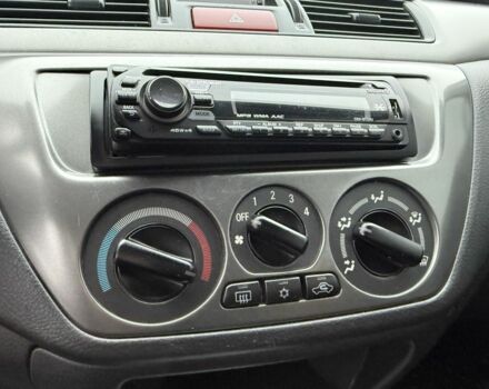 Сірий Міцубісі Lancer, об'ємом двигуна 1.6 л та пробігом 62 тис. км за 7300 $, фото 13 на Automoto.ua