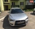 Серый Мицубиси Лансер, объемом двигателя 1.5 л и пробегом 182 тыс. км за 5150 $, фото 1 на Automoto.ua