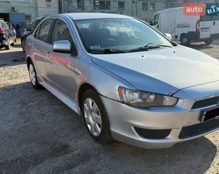 Серый Мицубиси Лансер, объемом двигателя 2 л и пробегом 272 тыс. км за 4499 $, фото 2 на Automoto.ua