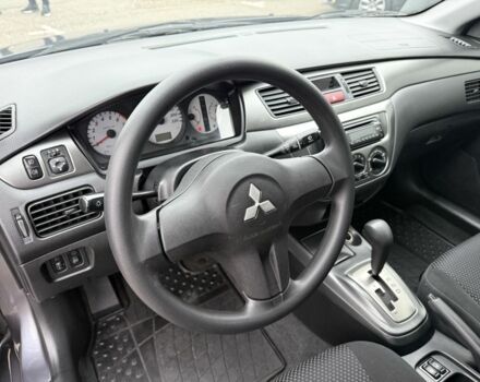 Сірий Міцубісі Lancer, об'ємом двигуна 1.6 л та пробігом 62 тис. км за 7300 $, фото 23 на Automoto.ua