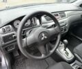 Сірий Міцубісі Lancer, об'ємом двигуна 1.6 л та пробігом 62 тис. км за 7300 $, фото 23 на Automoto.ua